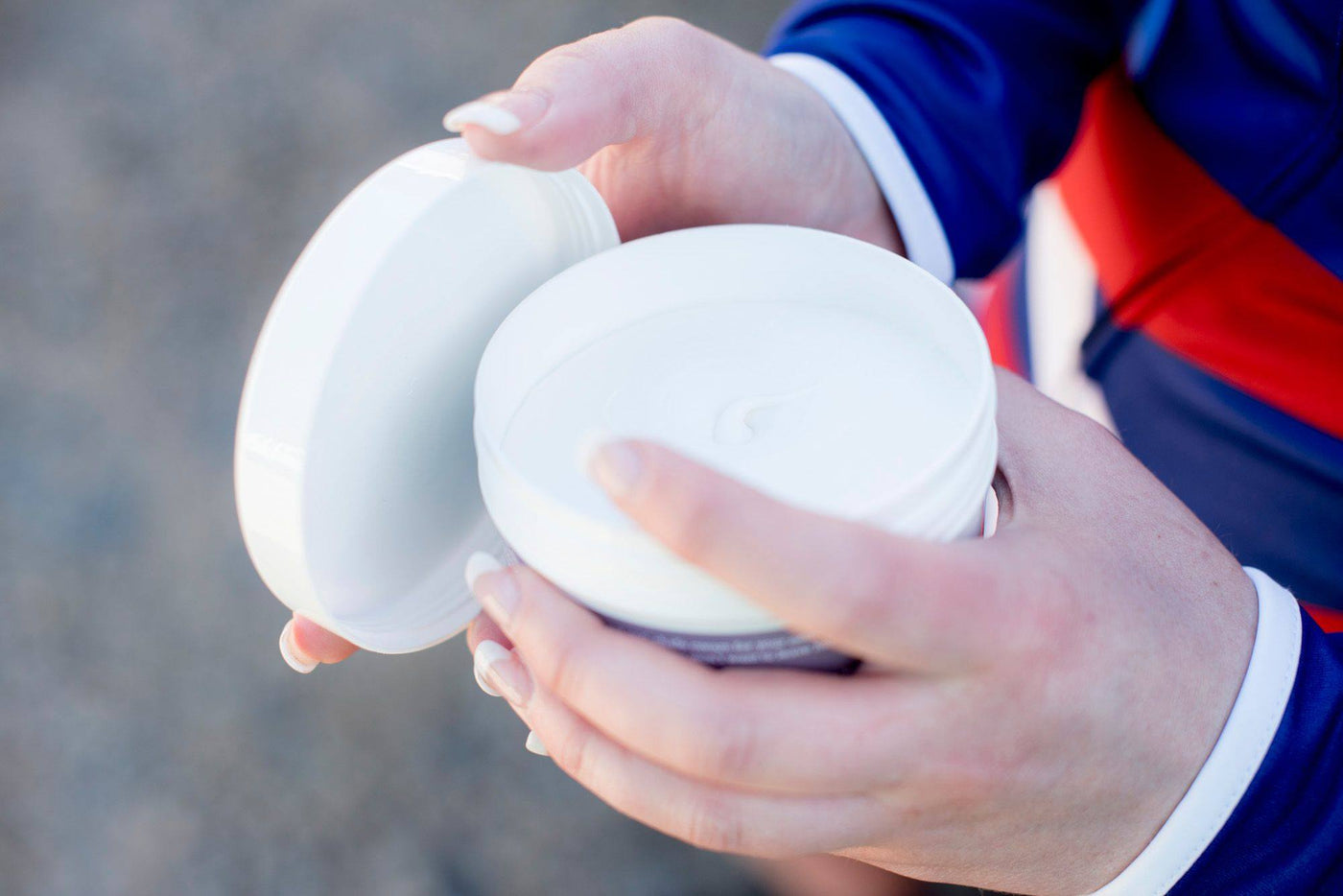 ASS MAGIC Chamois Cream 200ml Tub being held in a women's hands