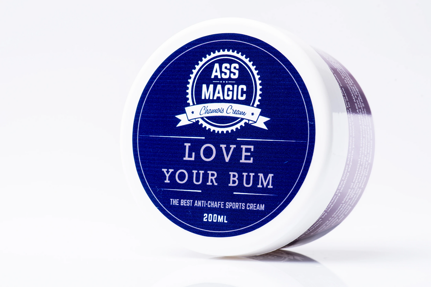 Ass Magic Chamois Cream 200ml Tub in navy packaging, balancing on its side