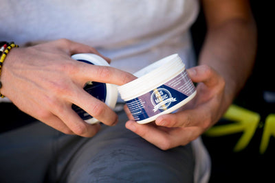 Ass Magic Chamois Cream 200ml Tub being used by a cyclist.